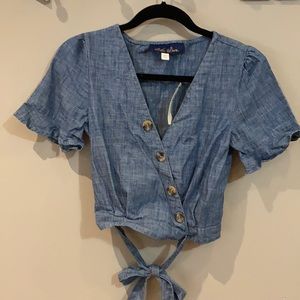 New with tags! Francesca’s Chambray ruffle top XS
